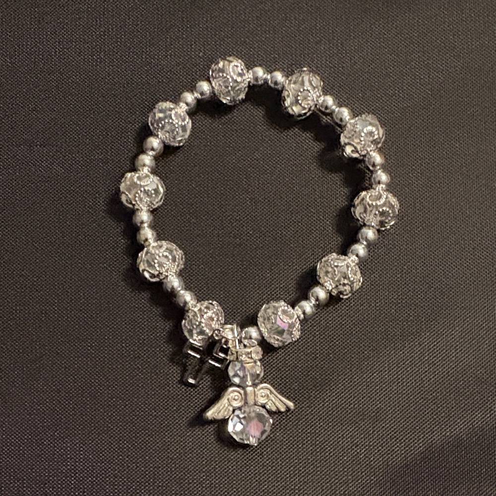 Elegant Silver Beaded Bracelet with Angel Charm